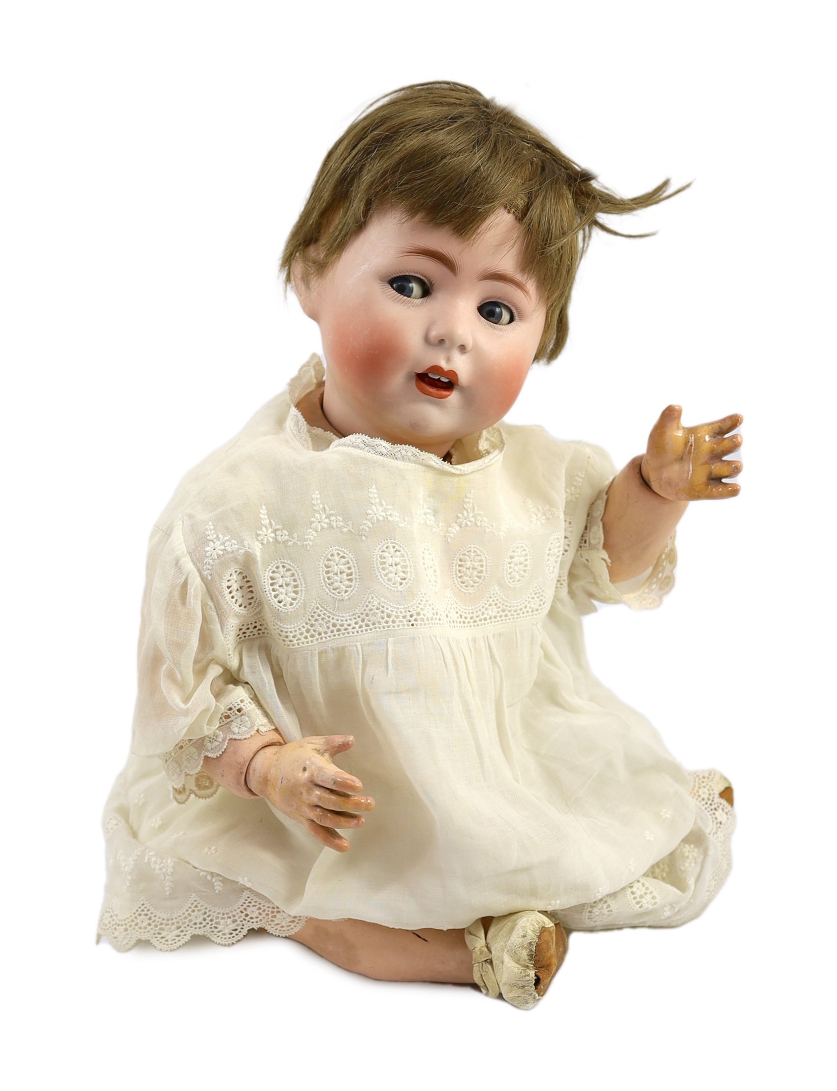 A Cuno and Otto Dressel Jutta bisque doll, German, circa 1914, 21in.